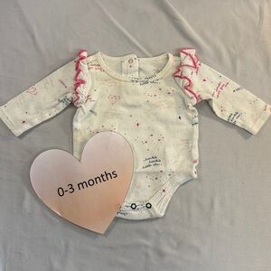 Pehr - Organic Cream and Pink Starry Kids One Piece Top with ruffled details